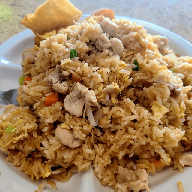 Chicken fried rice special(includes eggroll and crab rangoon ).