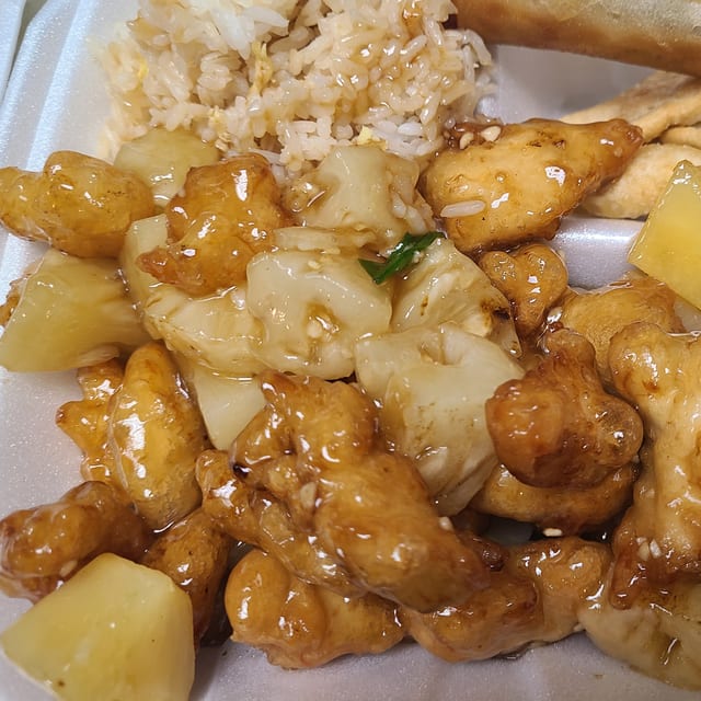Pineapple Chicken special (includes eggroll,crab rangoon and rice).